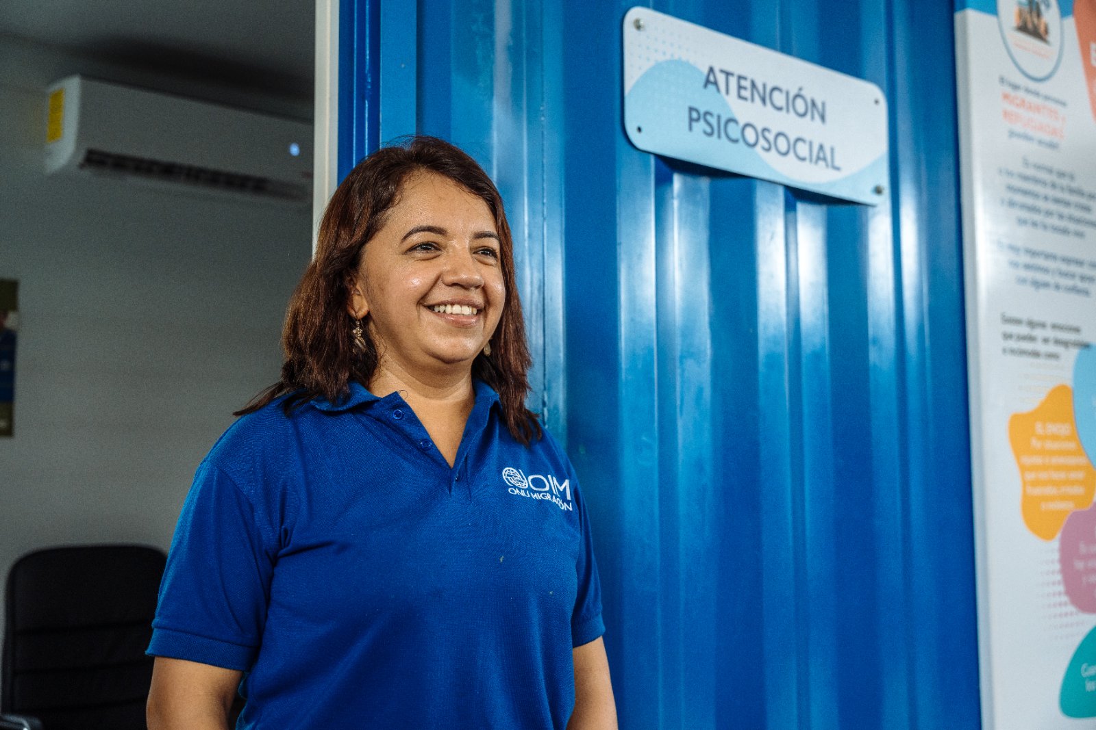 An IOM colleague at a psychosocial support point